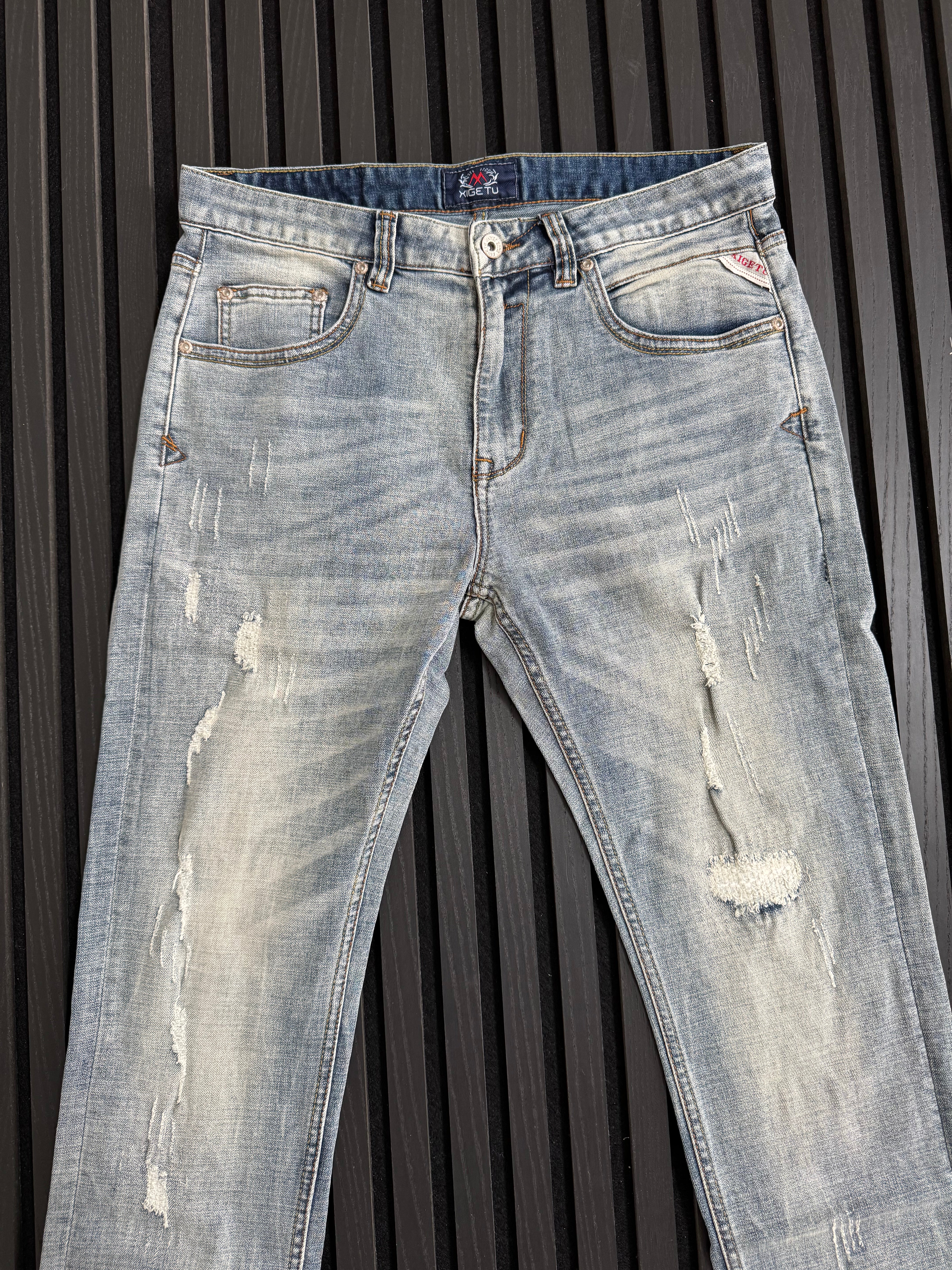 Light Wash Distressed Denim Jeans