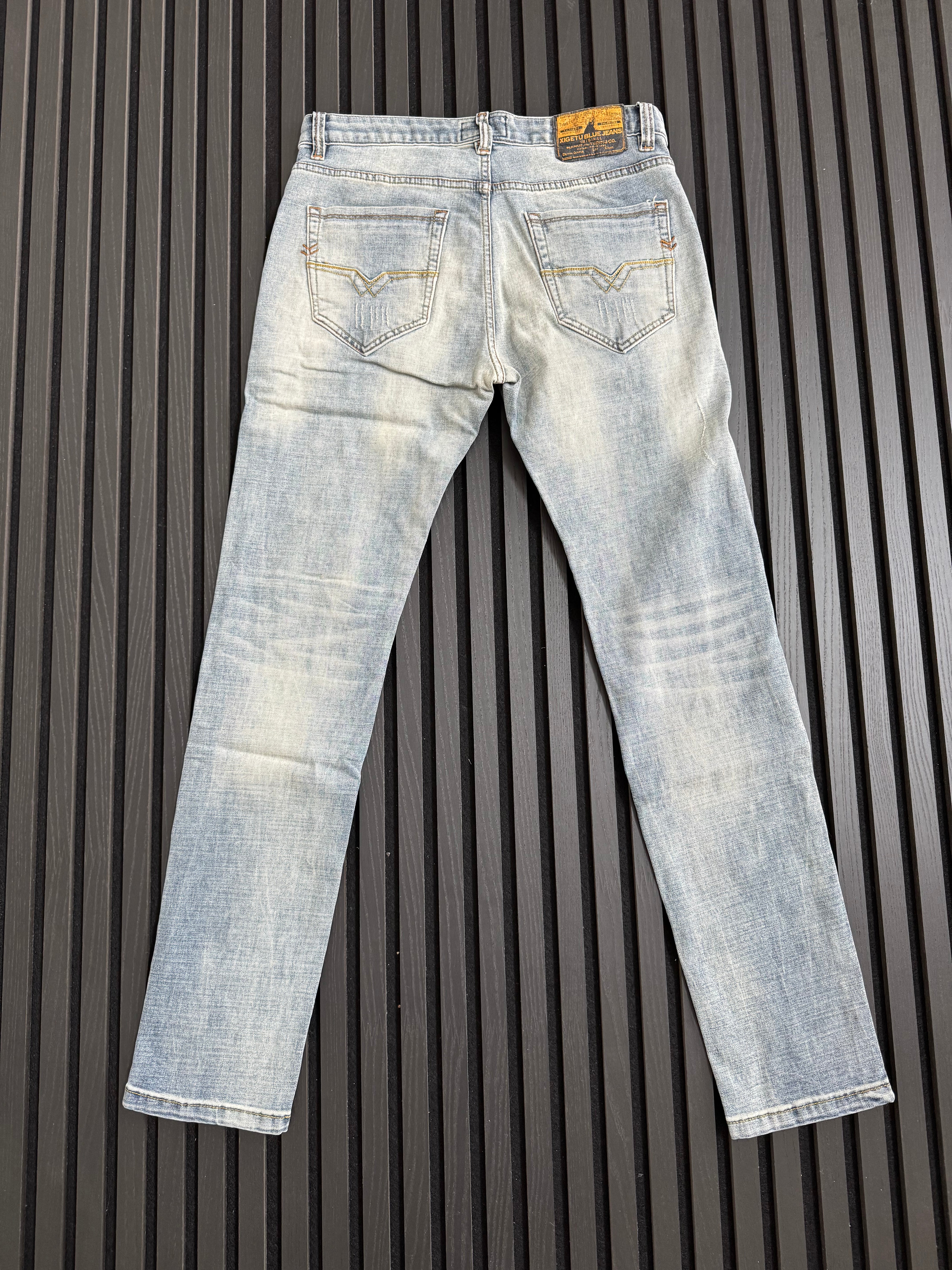 Light Wash Distressed Denim Jeans