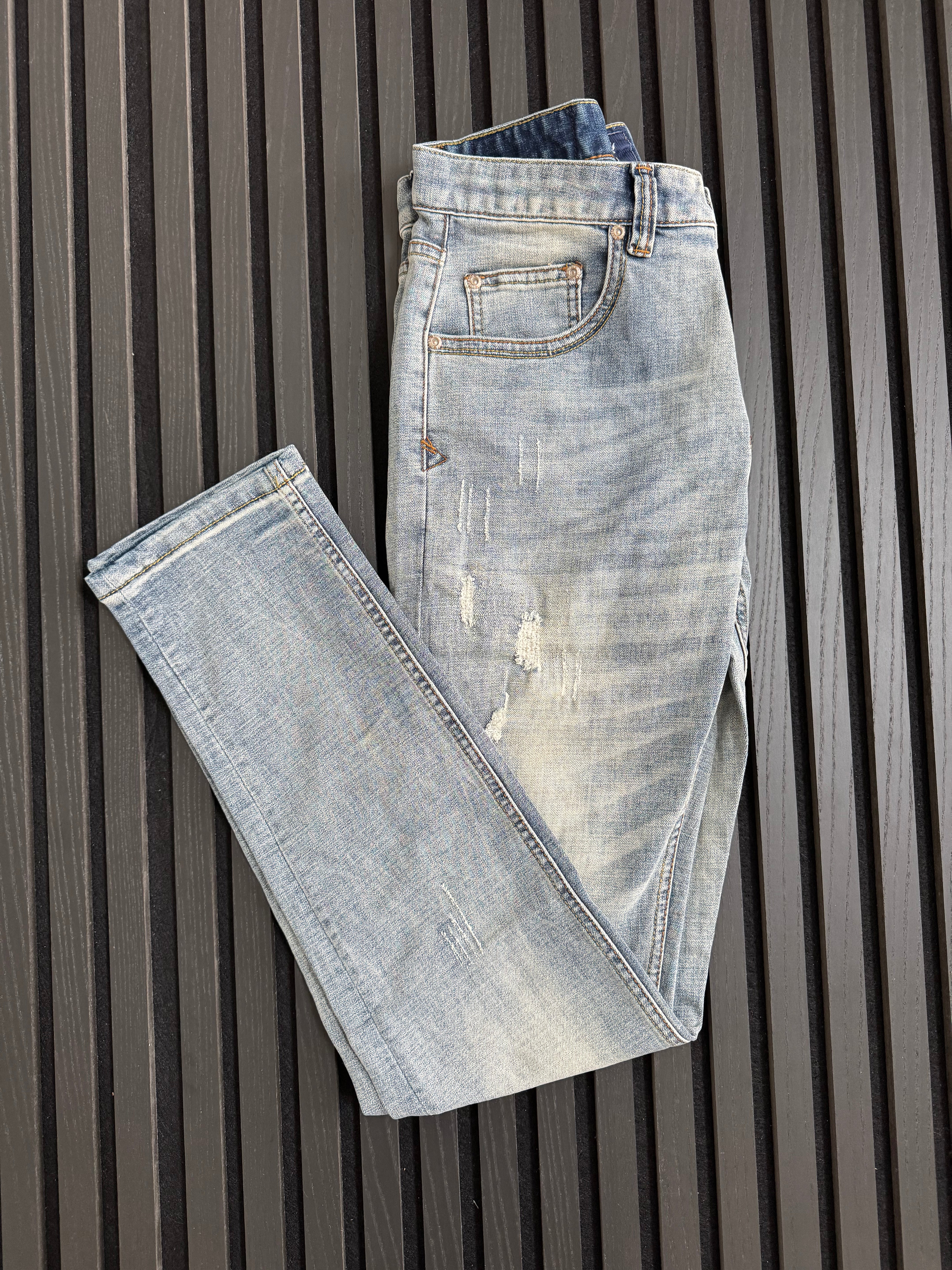 Light Wash Distressed Denim Jeans